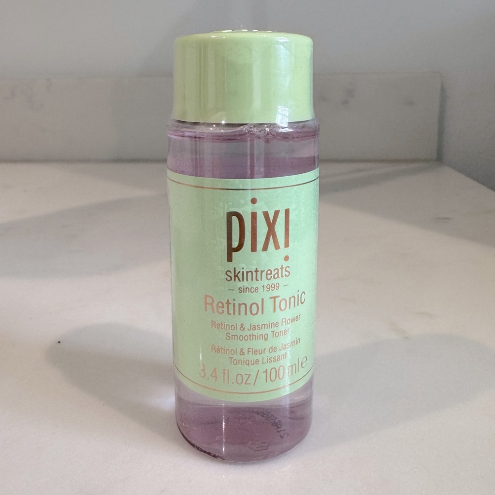 Pixi Retinol Tonic with Green Cap and Purple Liquid